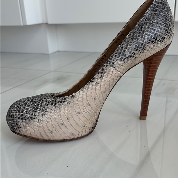 Stuart Weitzman Two Tone Watersnake Platform Pumps
7.5 - Picture 6 of 6